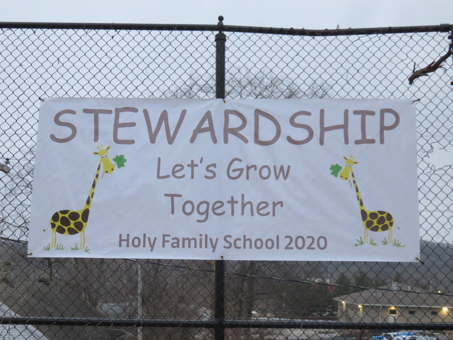 This stewardship bulletin board is located near the entrance to Holy Family School.